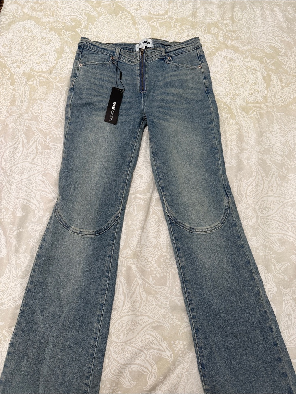 Fashion Nova Light Blue Flare Jeans with Knee Panel Accents